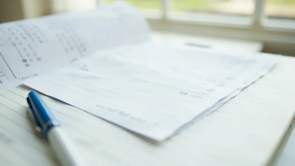 Coach measuring a young gymnast's torso and hips for leotard sizing